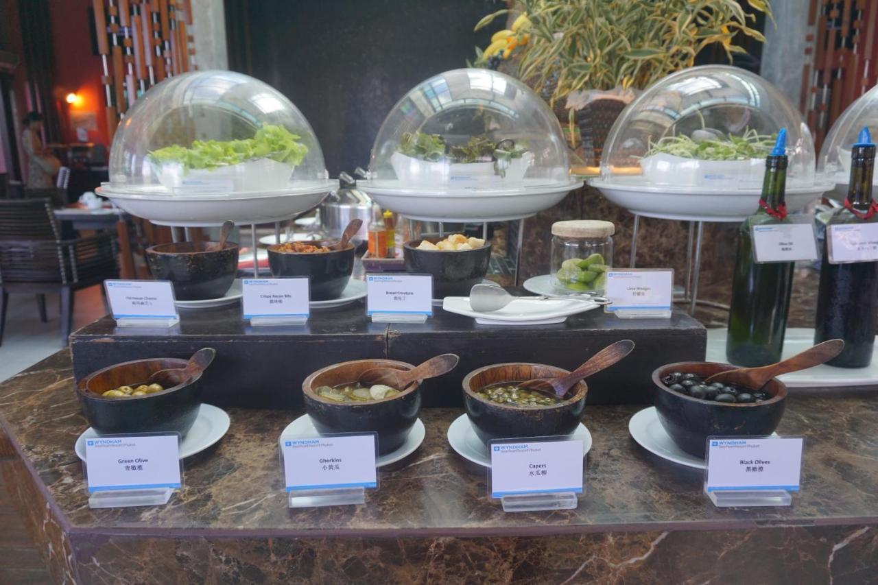 Wyndham Sea Pearl Resort, Phuket Patong Exterior foto A selection of garnishes at a buffet